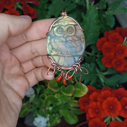 Owl sitting on a dogwood branch. Pendant.