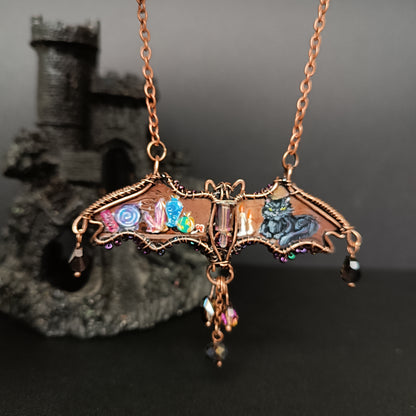 Halloween story. Painted bat necklace