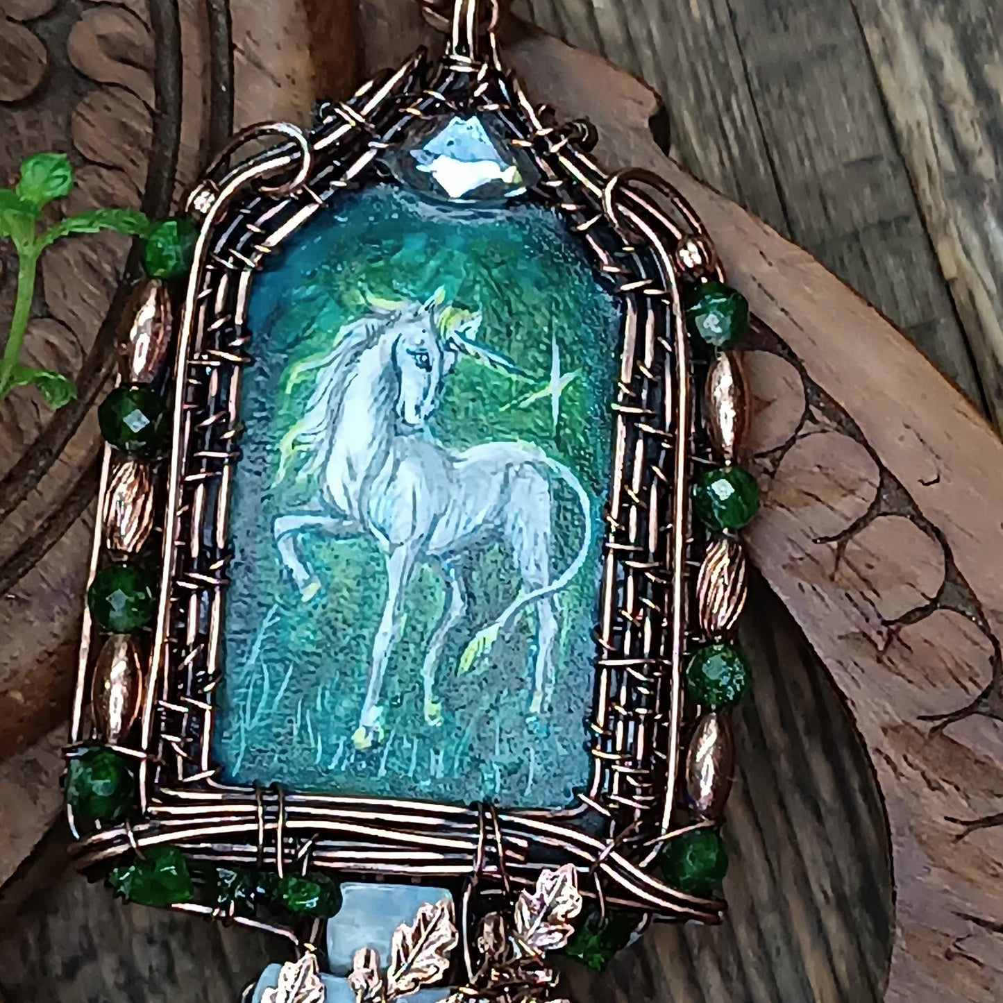 The ballad of white unicorn and princess. Wire wrapped necklace with miniature paintings.