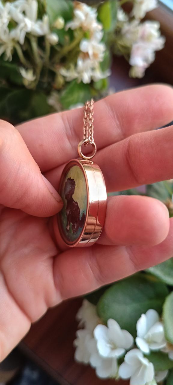 Custom miniature painted necklace.