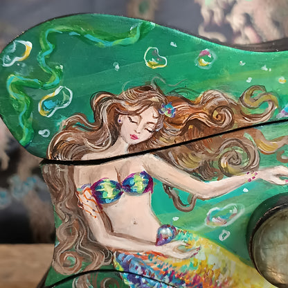 Collecting rainbow bubbles. Hand painted treasures box.