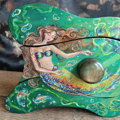 Collecting rainbow bubbles. Hand painted treasures box.