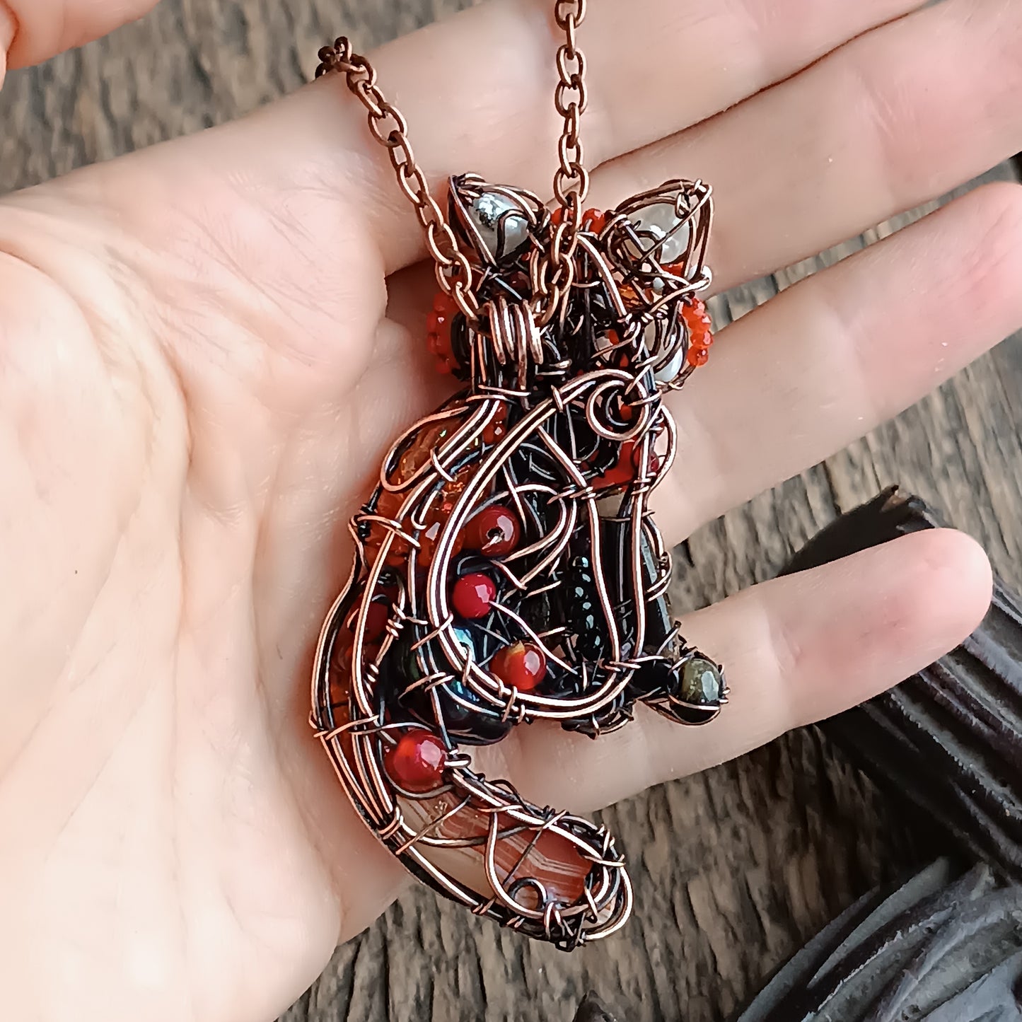 For Hanne. Red panda pendant