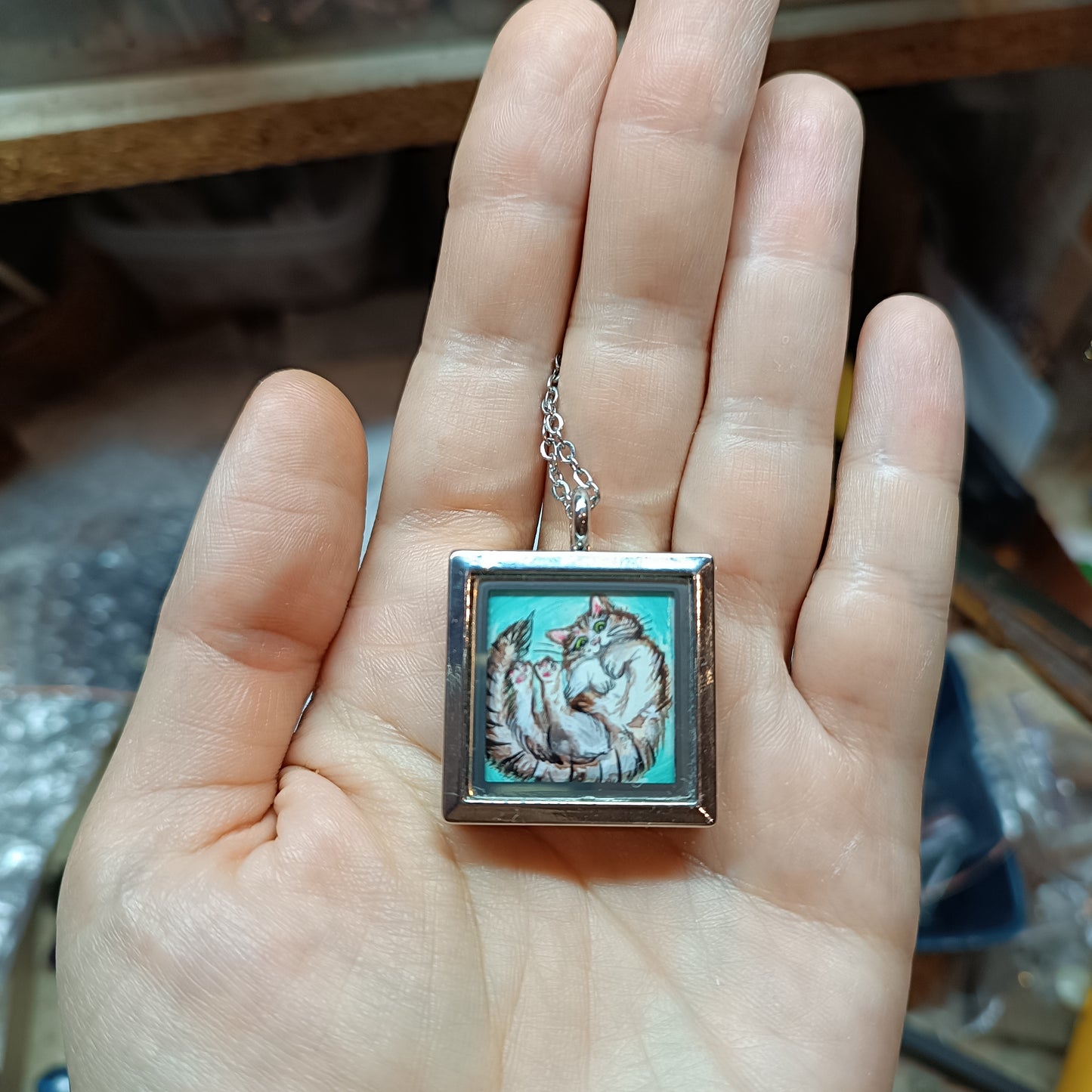 Cats in the box! Hand painted pendant. Reversible.