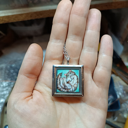 Cats in the box! Hand painted pendant. Reversible.