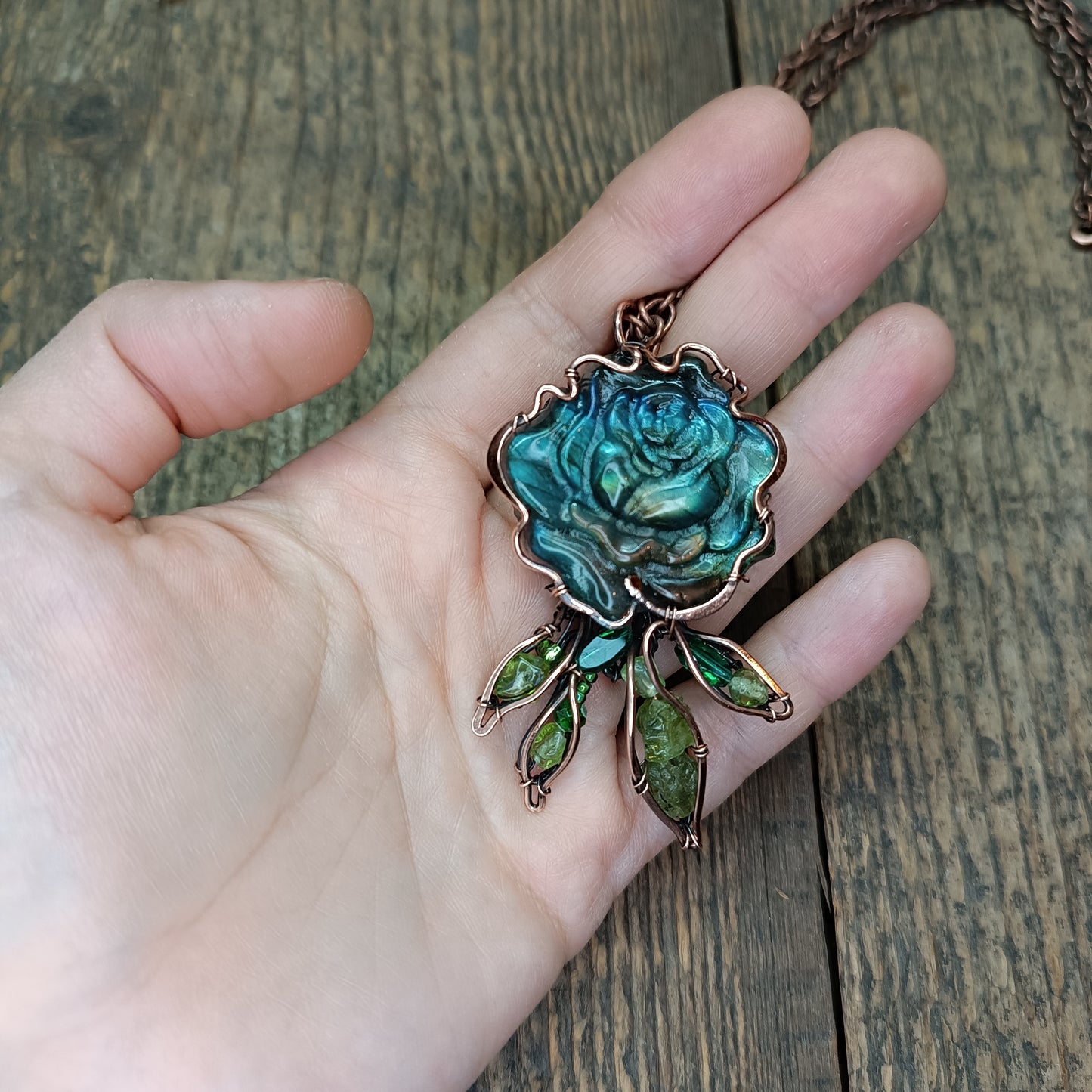 Blue rose with hidden rainbows. Necklace.