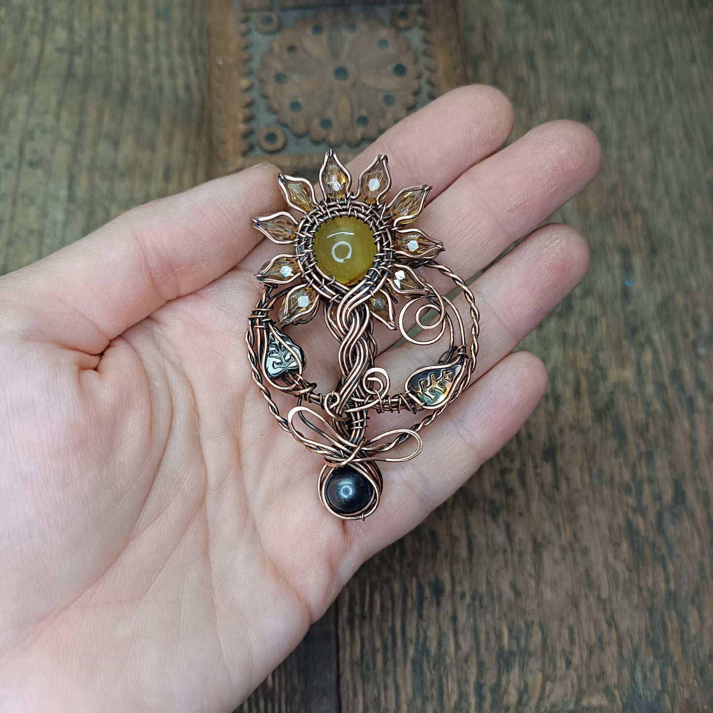 Sunflower pendant with black pearl root