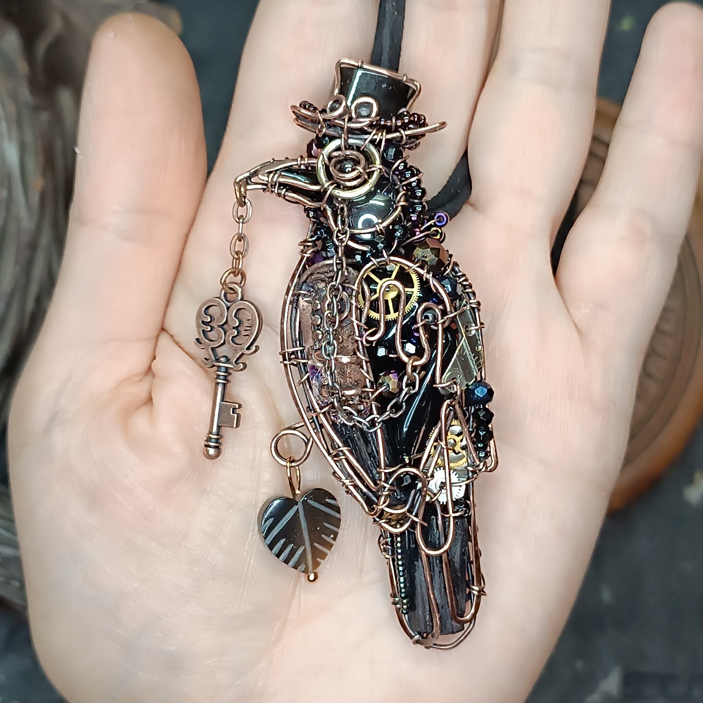 Steampunk raven necklace.