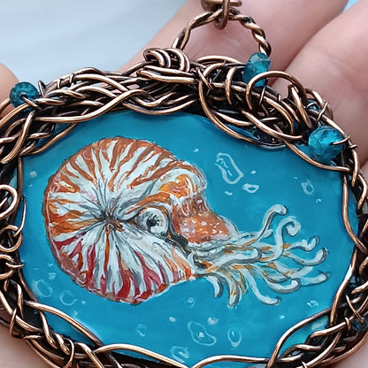 "Unforgettable diving". Wire wrapped and hand painted necklace.