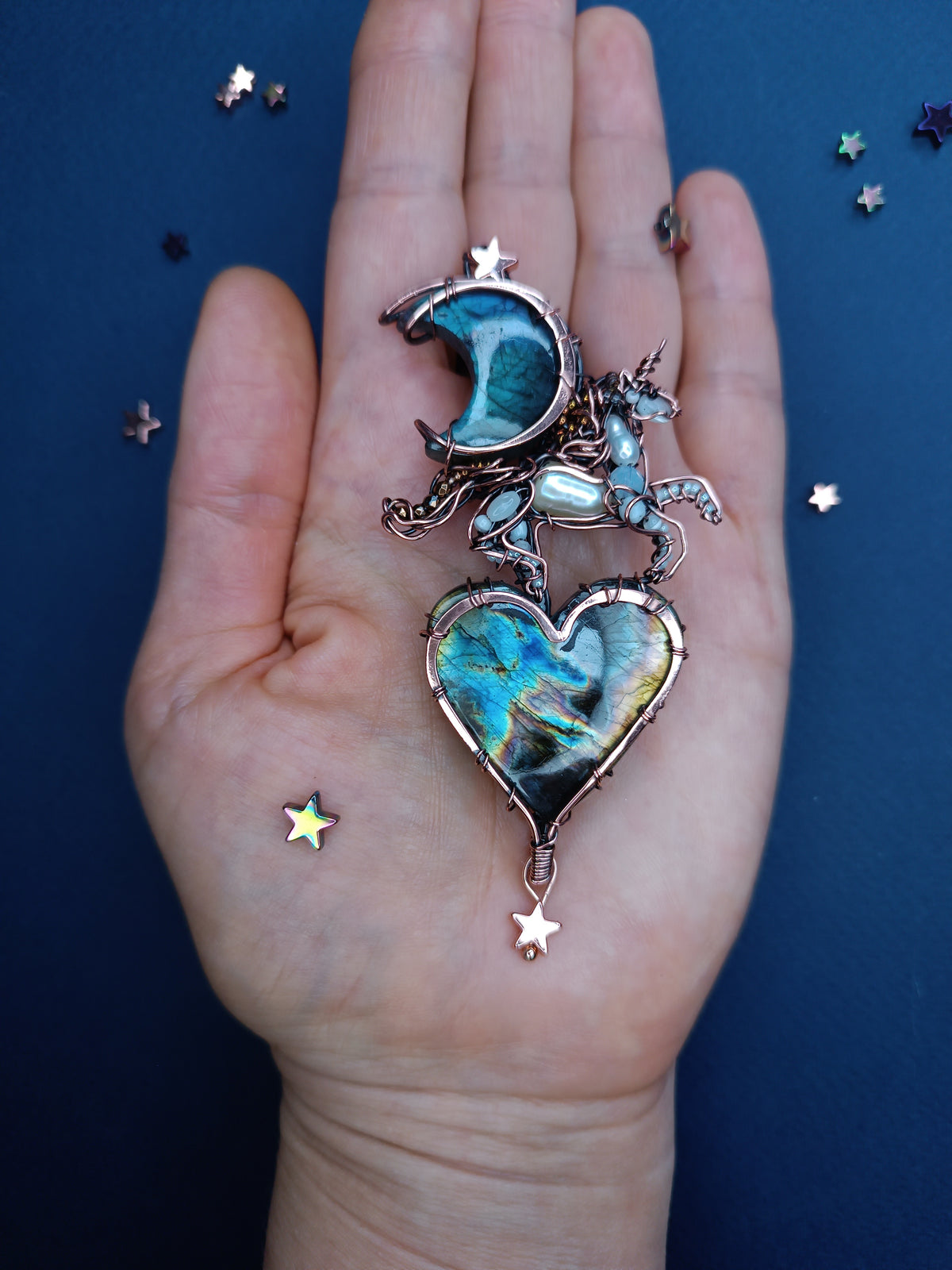 Space unicorn necklace.