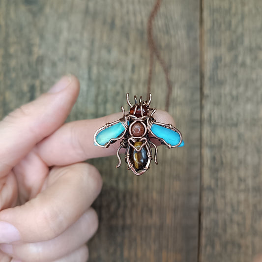 Little blue winged bee charm