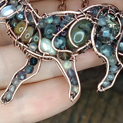 Wolf pendant.