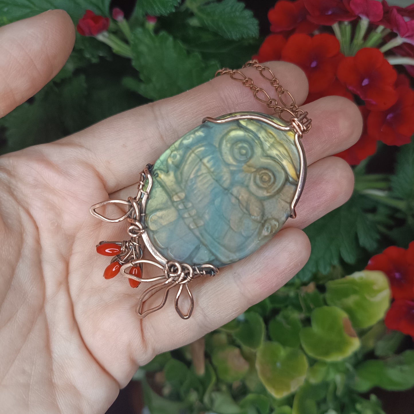 Owl sitting on a dogwood branch. Pendant.