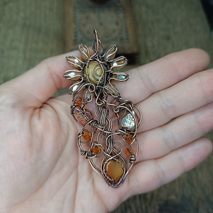 Sunflower pendant with carnelian heart root