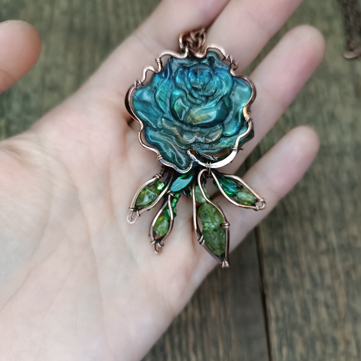 Blue rose with hidden rainbows. Necklace.
