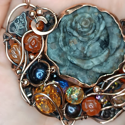 Hidden fire. Rose necklace.