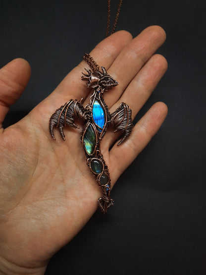 Dancing in the sky. Blue dragon with open wings. Copper pendant.