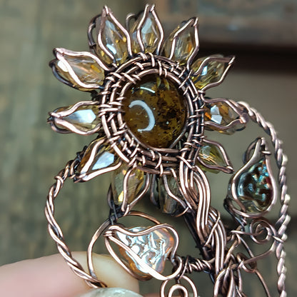 Sunflower pendant with garnet root