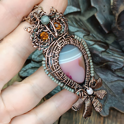 Owl necklace.