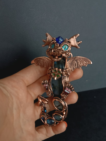 Blue baby dragon with shamrock necklace.