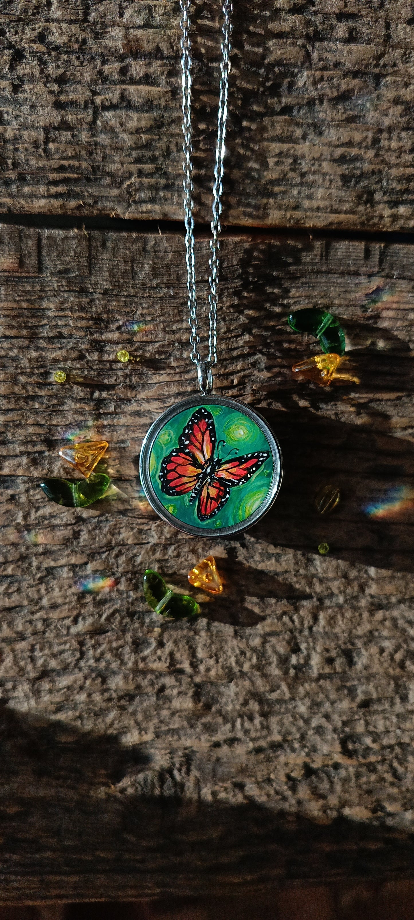 Cat admiring butterflies. Pendant.