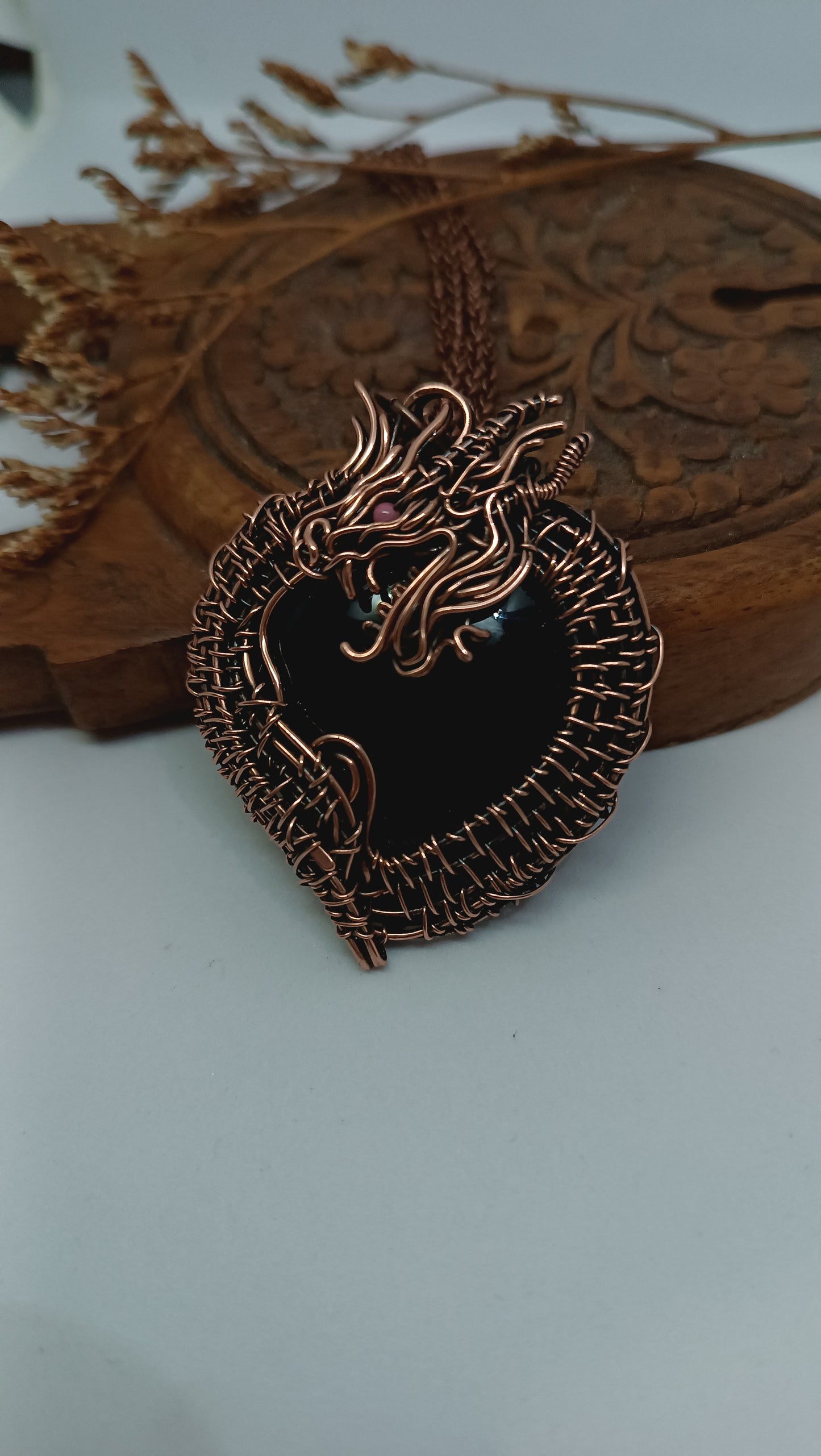 Black obsidian dragon pendant.