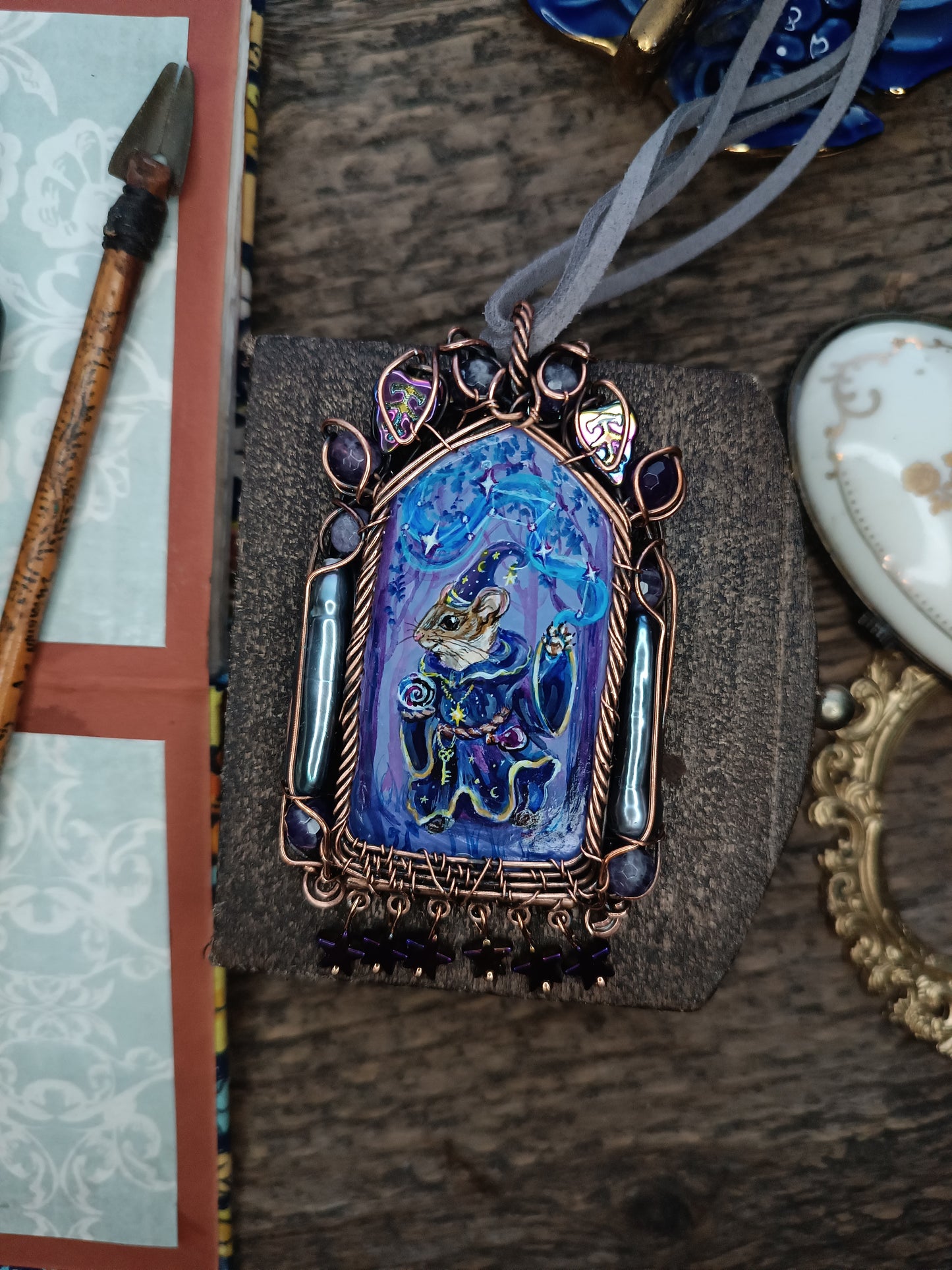 "Tiny magician". Wearable art necklace.