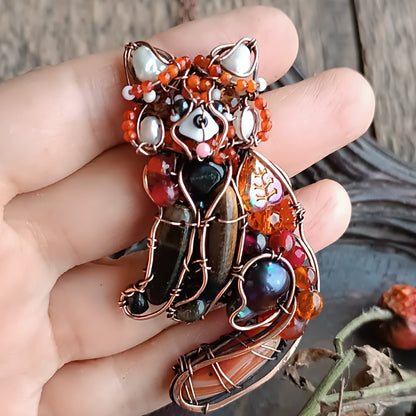 For Hanne. Red panda pendant