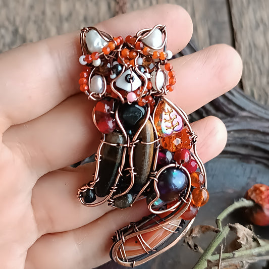 For Hanne. Red panda pendant