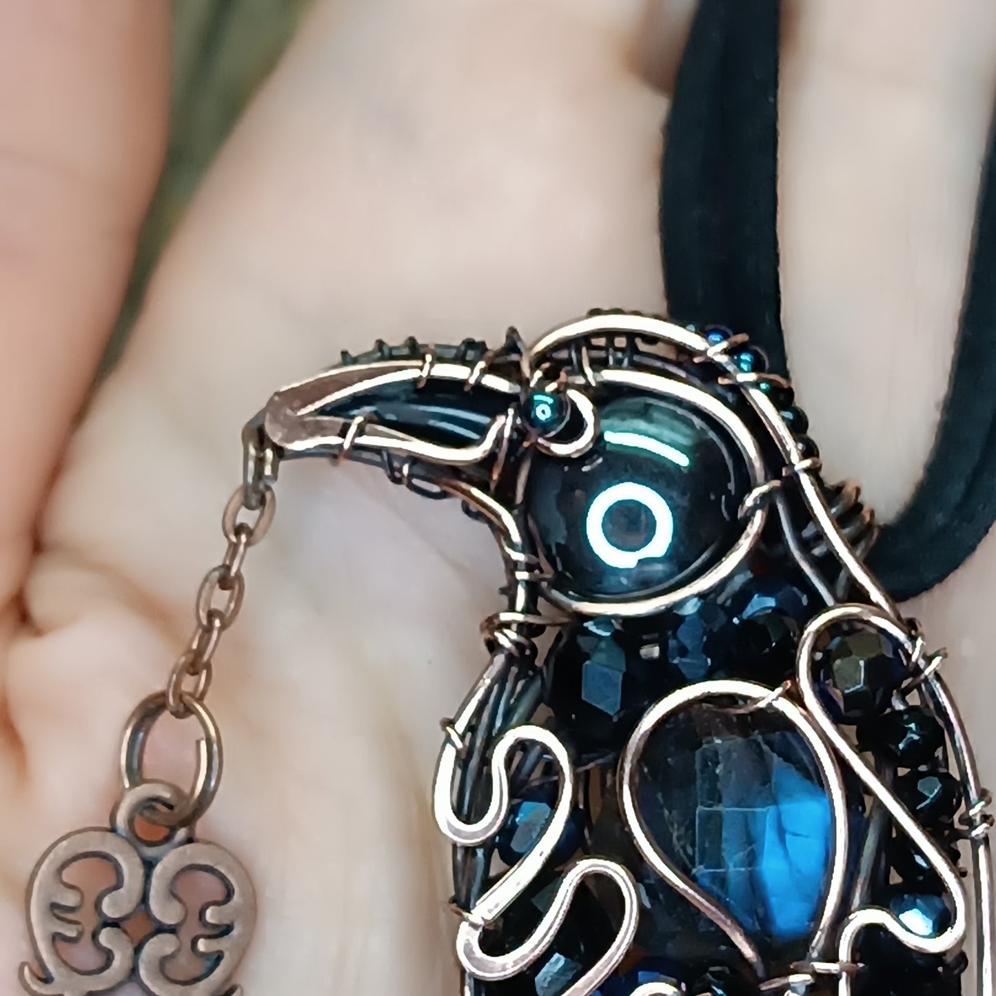 Secret keeper. Raven with the blue star. Wire wrapped necklace