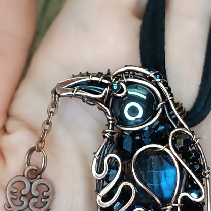 Secret keeper. Raven with the blue star. Wire wrapped necklace