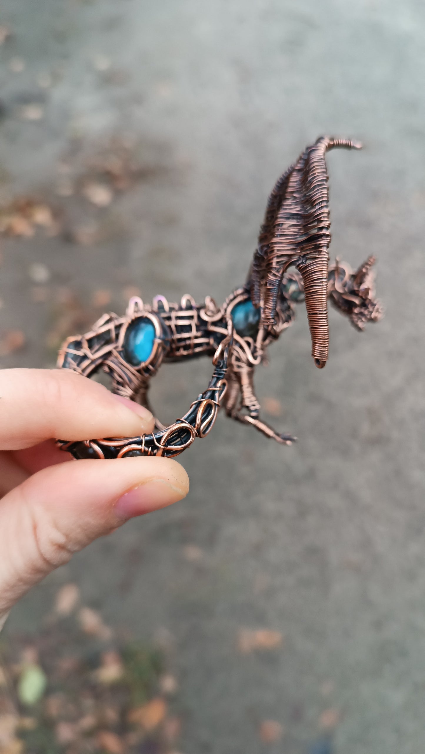 Dragon figurine with labradorites.