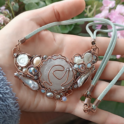 First snow. Rose necklace.