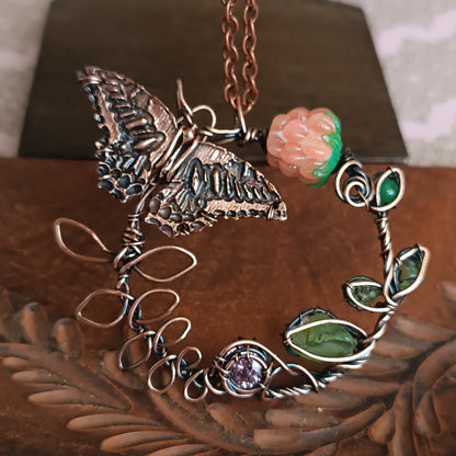 Life circle. Pink raspberry butterfly necklace