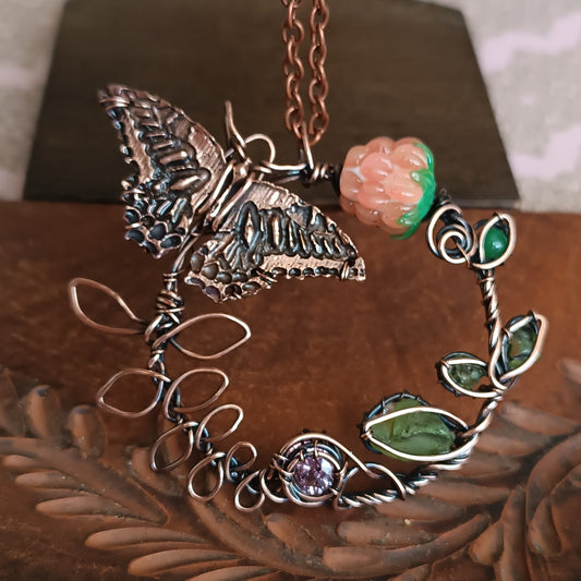 Life circle. Pink raspberry butterfly necklace