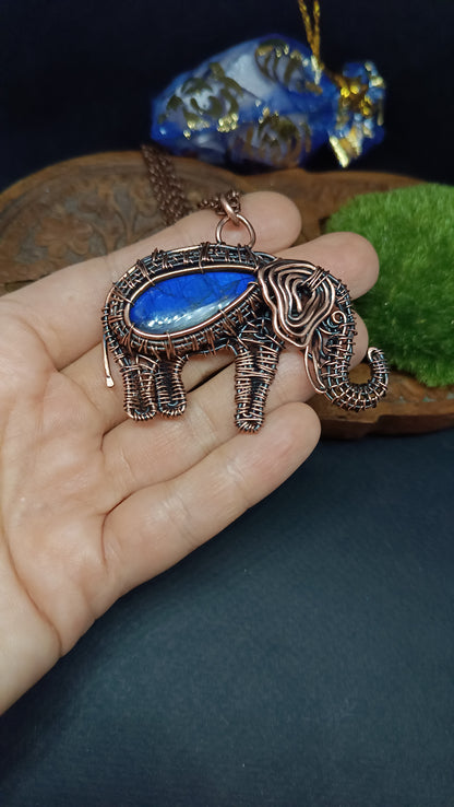 Blue elephant pendant.