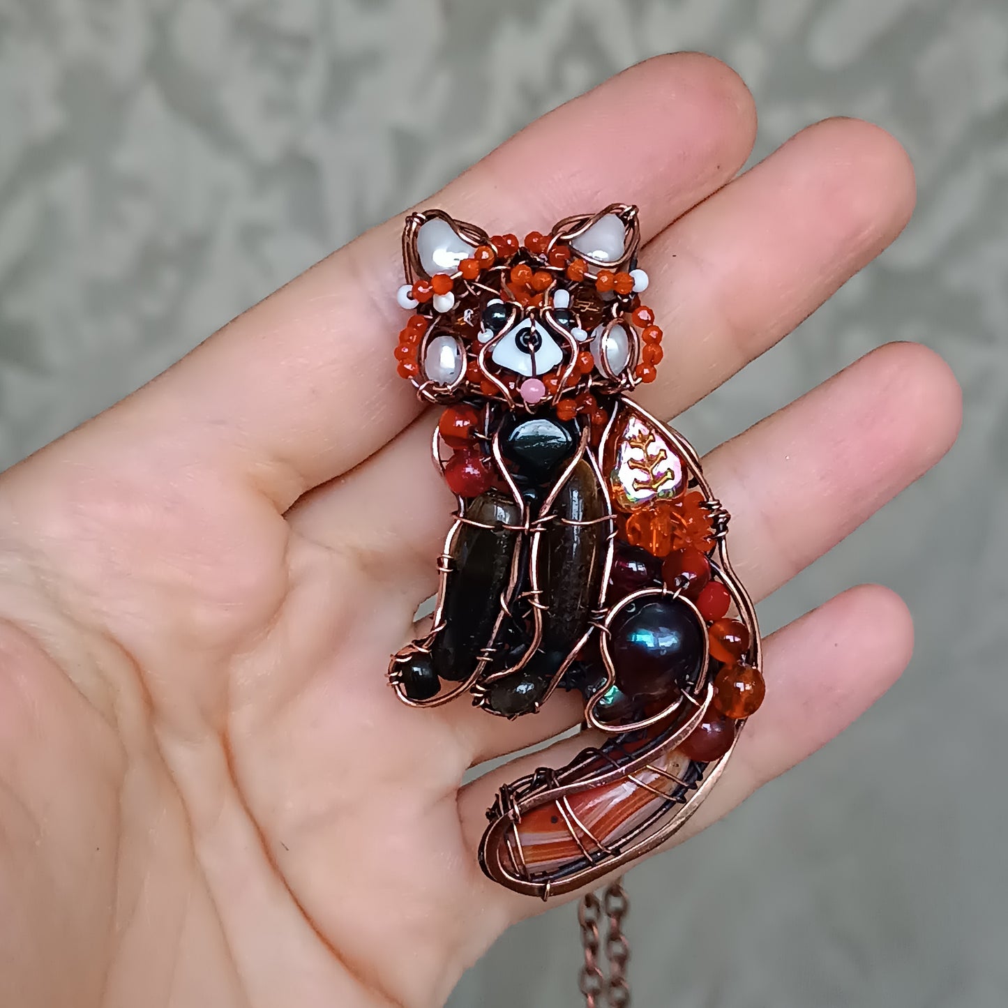 For Hanne. Red panda pendant