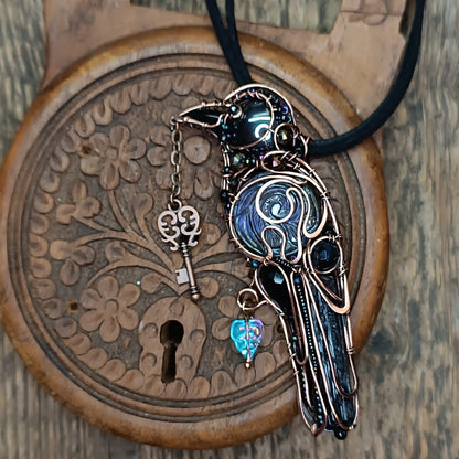 Purple wing Secret Keeper. Raven necklace.