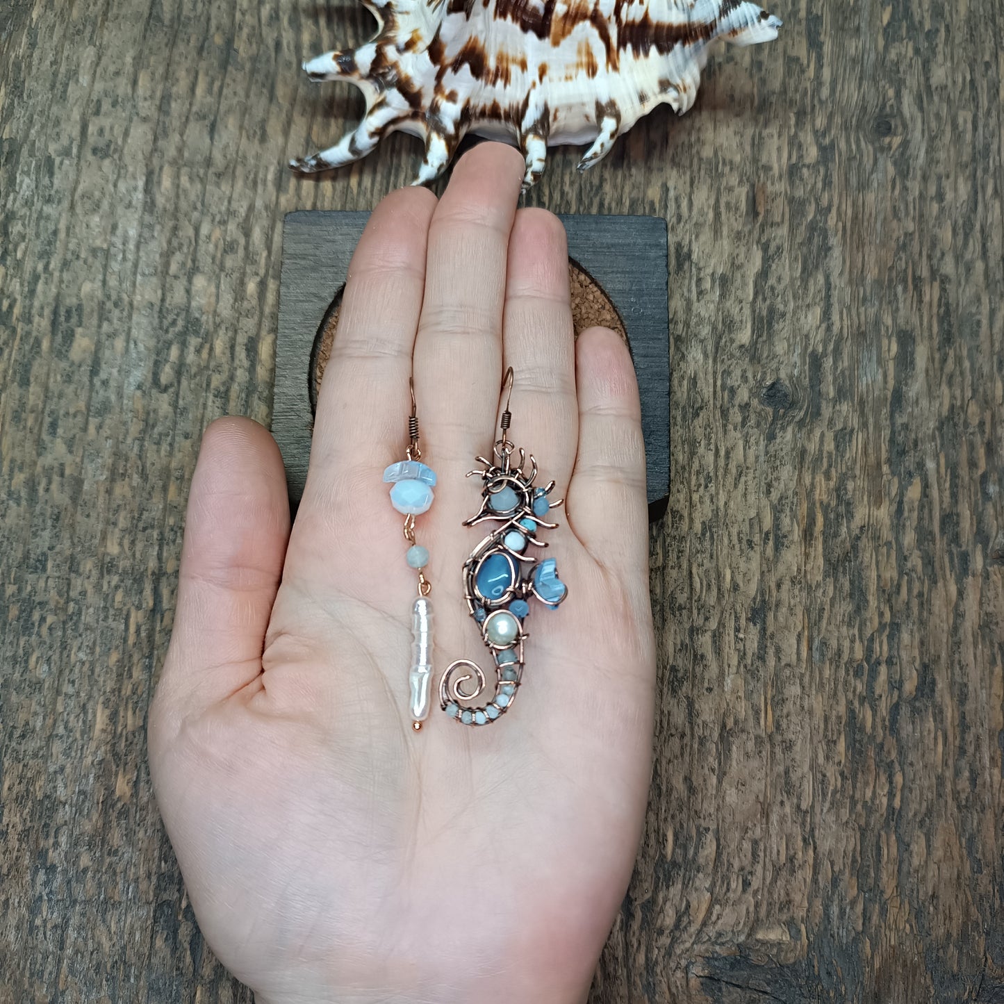 Blue and white seahorse earrings