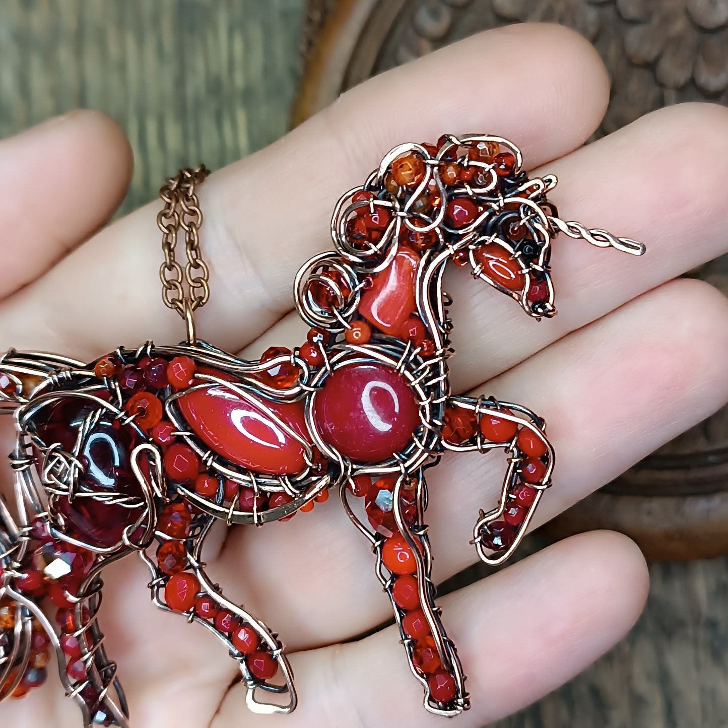 Red horse pendant.