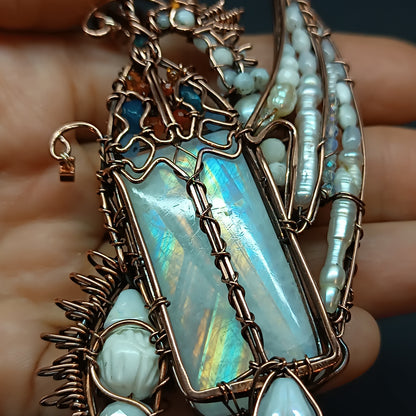 The ballad of the Pearl Dragon and the Moonstone Castle. Wire wrapped necklace