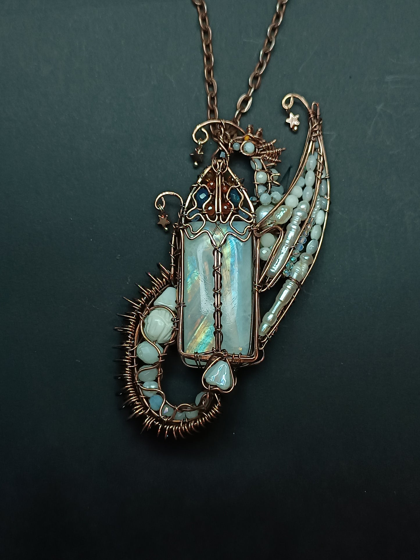 The ballad of the Pearl Dragon and the Moonstone Castle. Wire wrapped necklace