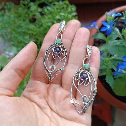 Silver dangling earrings. Amethyst bells.