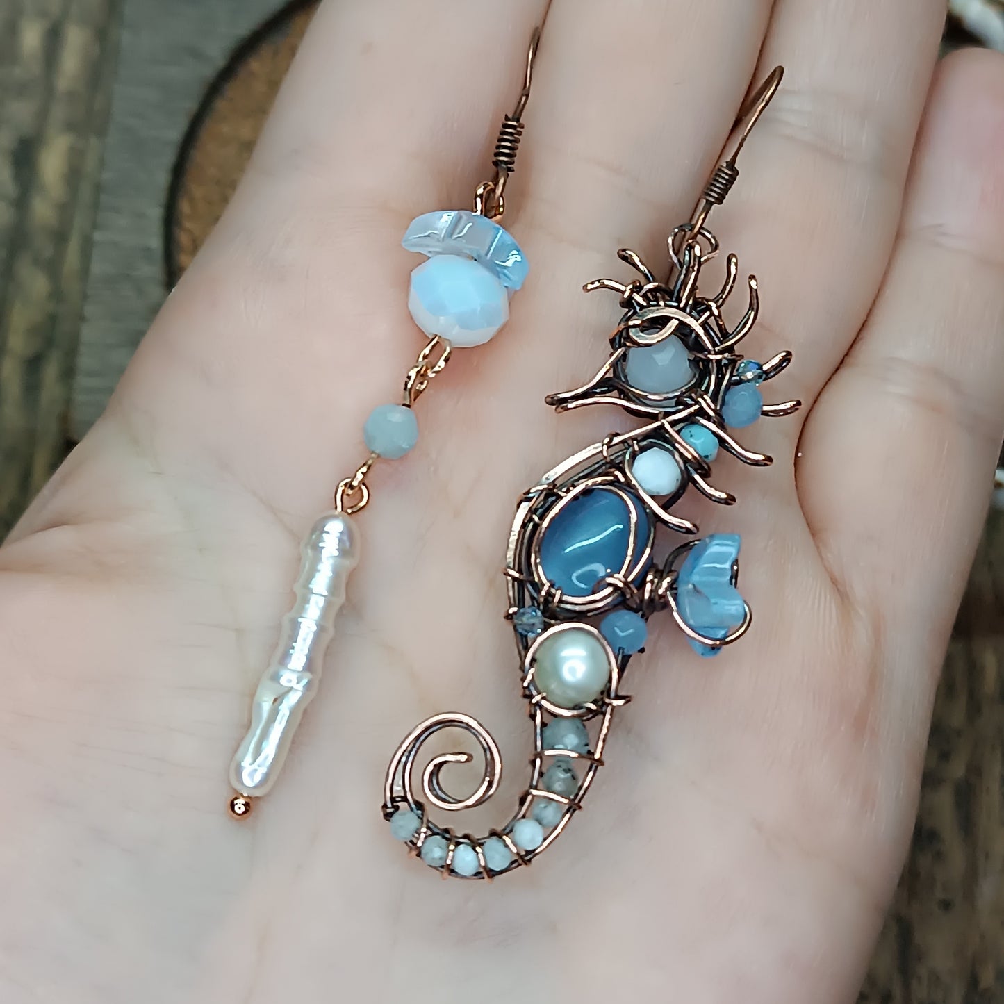 Blue and white seahorse earrings