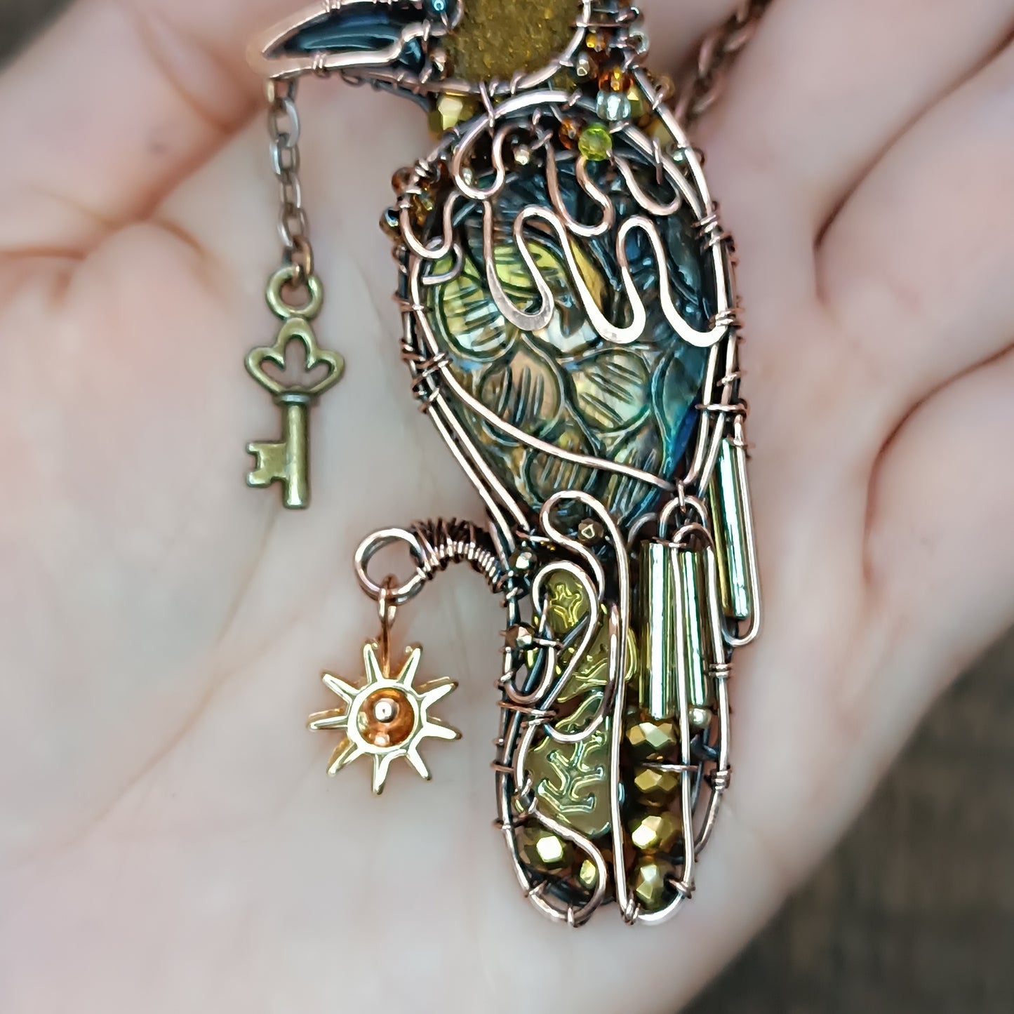 Secret keeper and The Sun. Raven necklace.