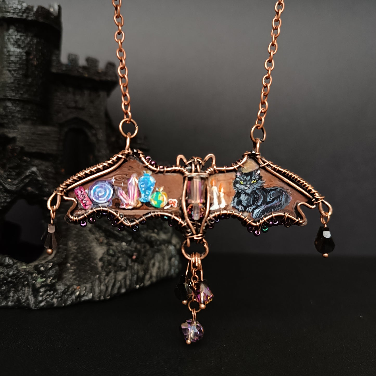 Halloween story. Painted bat necklace