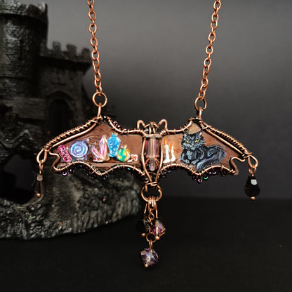 Halloween story. Painted bat necklace