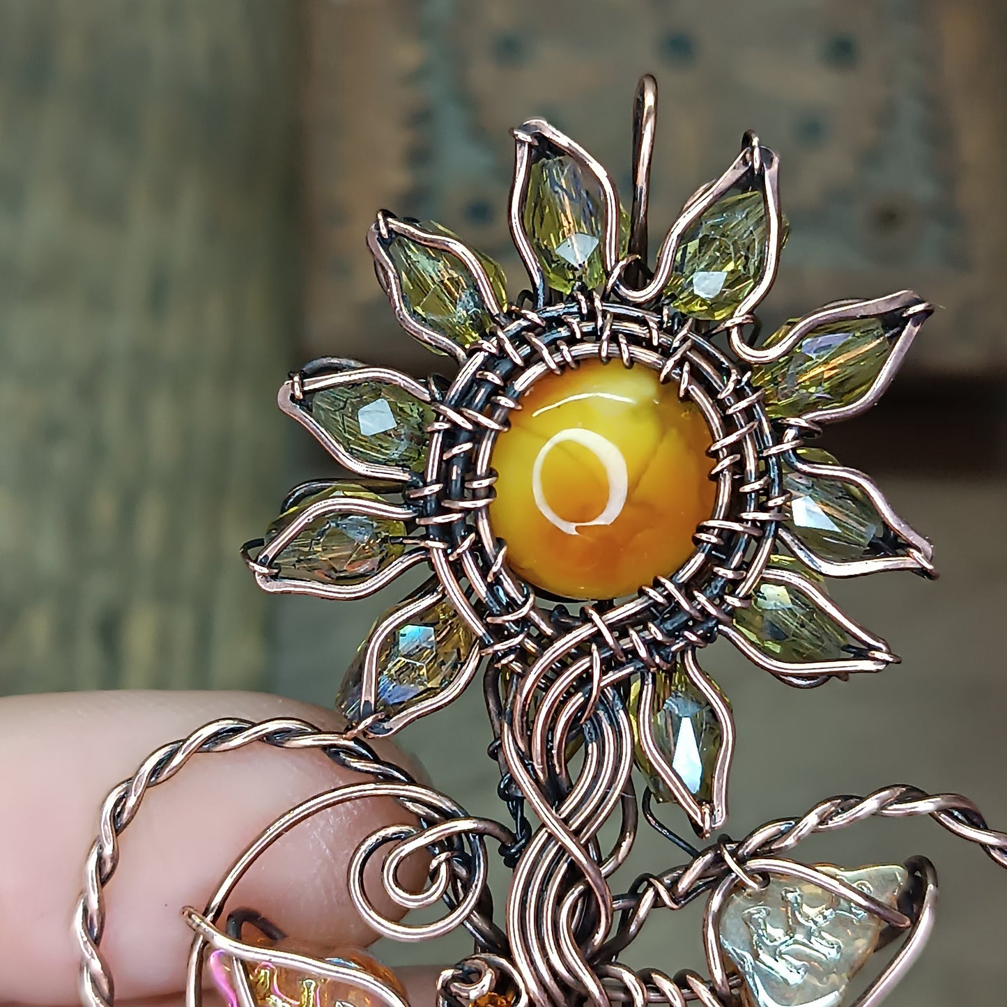 Sunflower pendant with citrine root.
