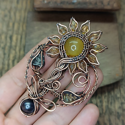Sunflower pendant with black pearl root