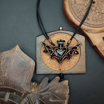 Black (with some purple) bat bottle necklace